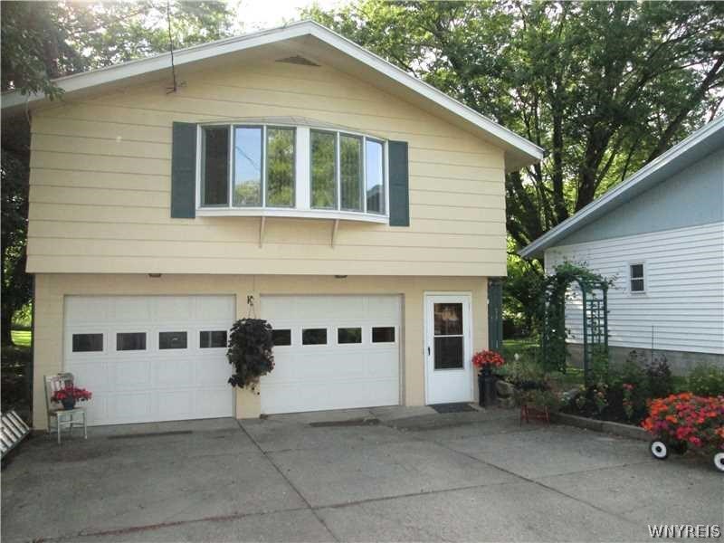 8098 East Eden Road Eden, NY 14057 - Photo 1 of 1 front view of 8098 East Eden rd. perennial garde