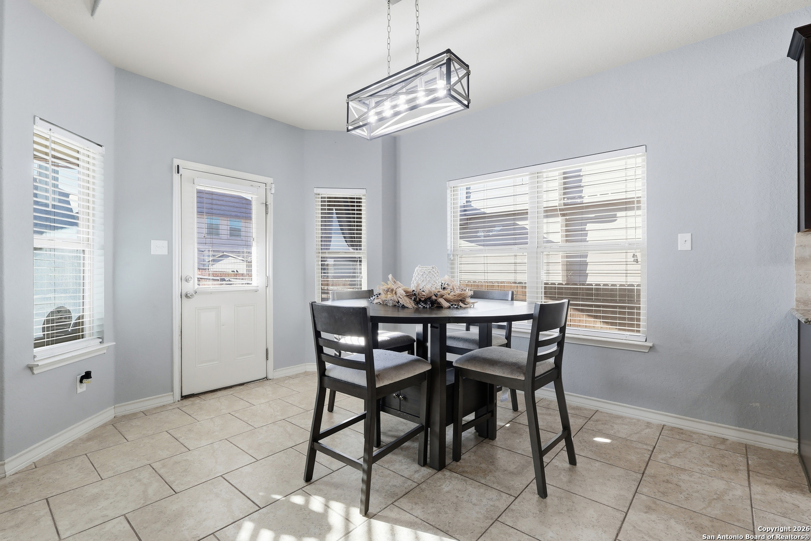 345 Morgan Run Cibolo, TX 78108 - Photo 3 of 22 a dining room with furniture and window