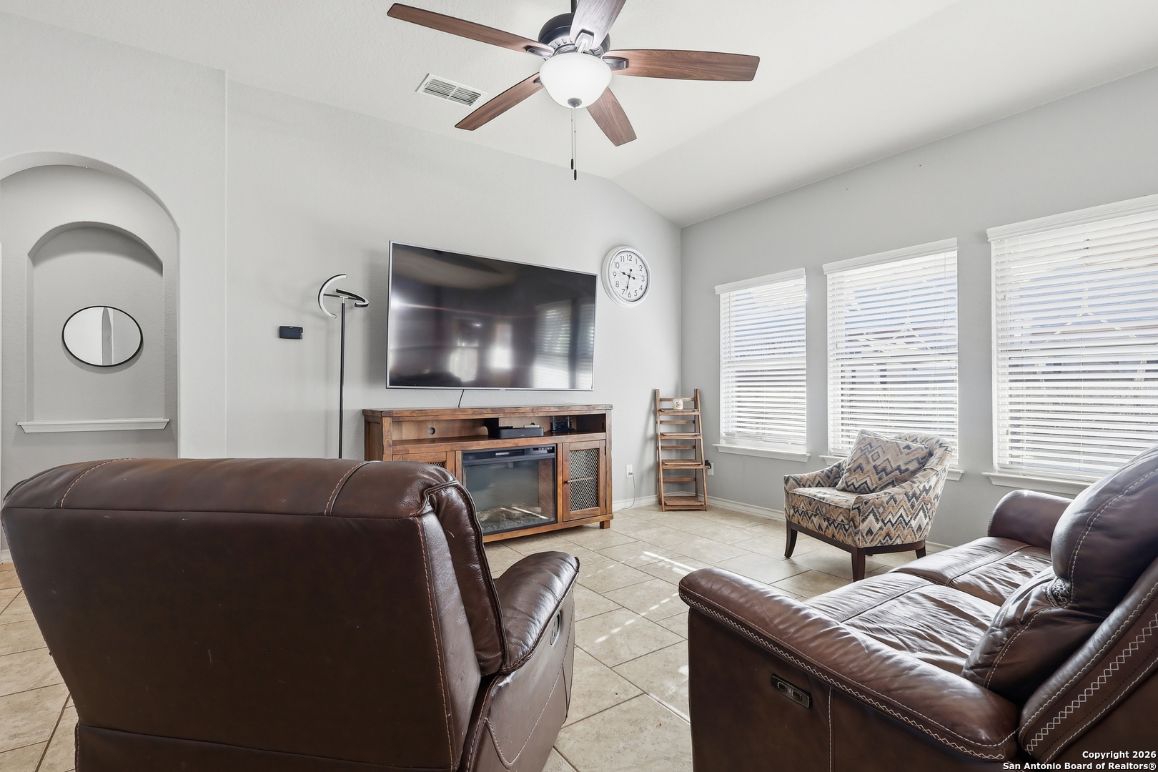 345 Morgan Run Cibolo, TX 78108 - Photo 8 of 22 a living room with furniture and a flat screen tv