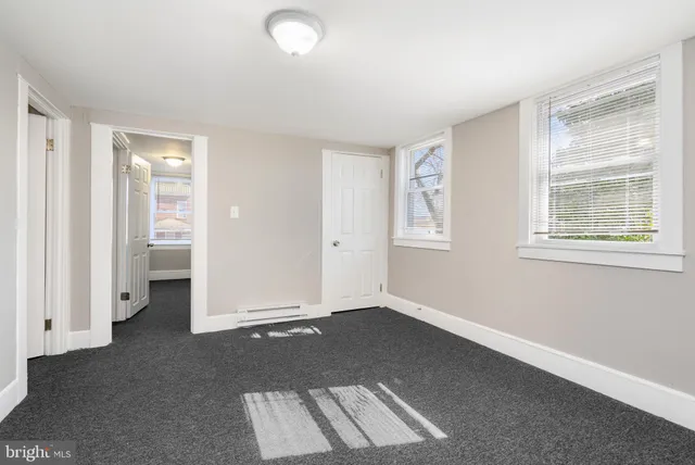 an empty room with windows