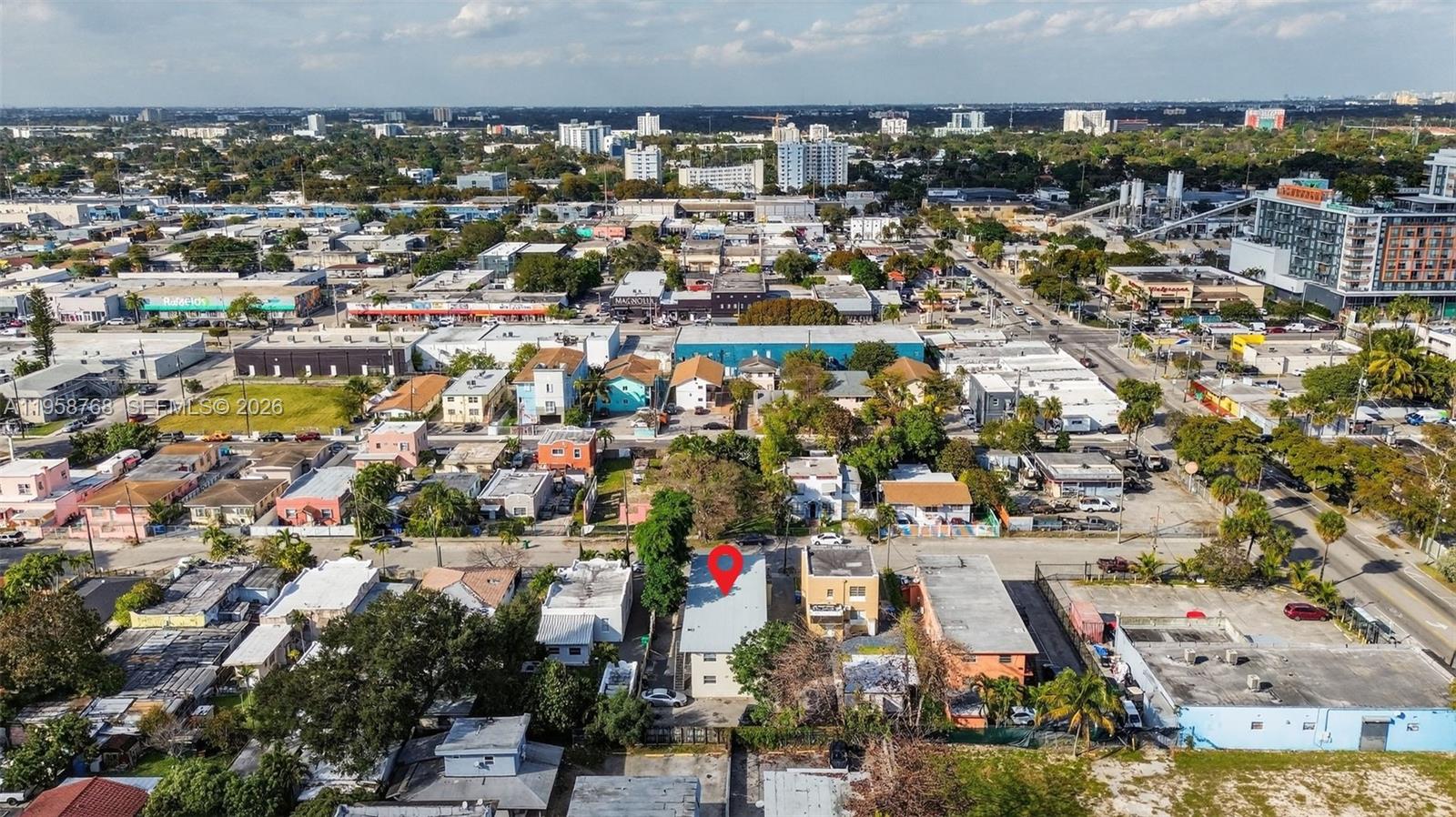 1736 Northwest 19th Street Miami, FL 33125 - Photo 15 of 17 an aerial view of a city