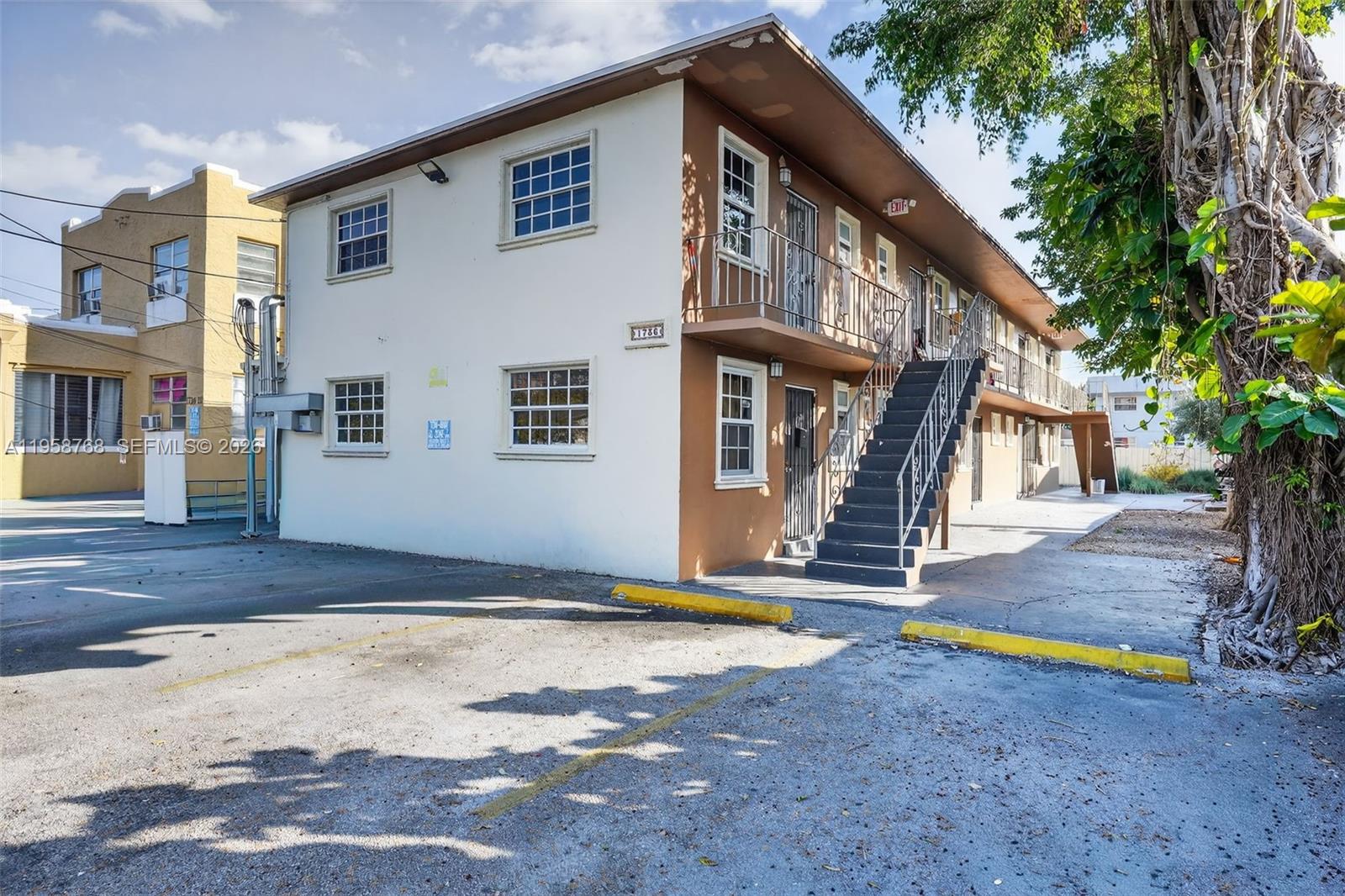 1736 Northwest 19th Street Miami, FL 33125 - Photo 5 of 17 a view of backyard of house