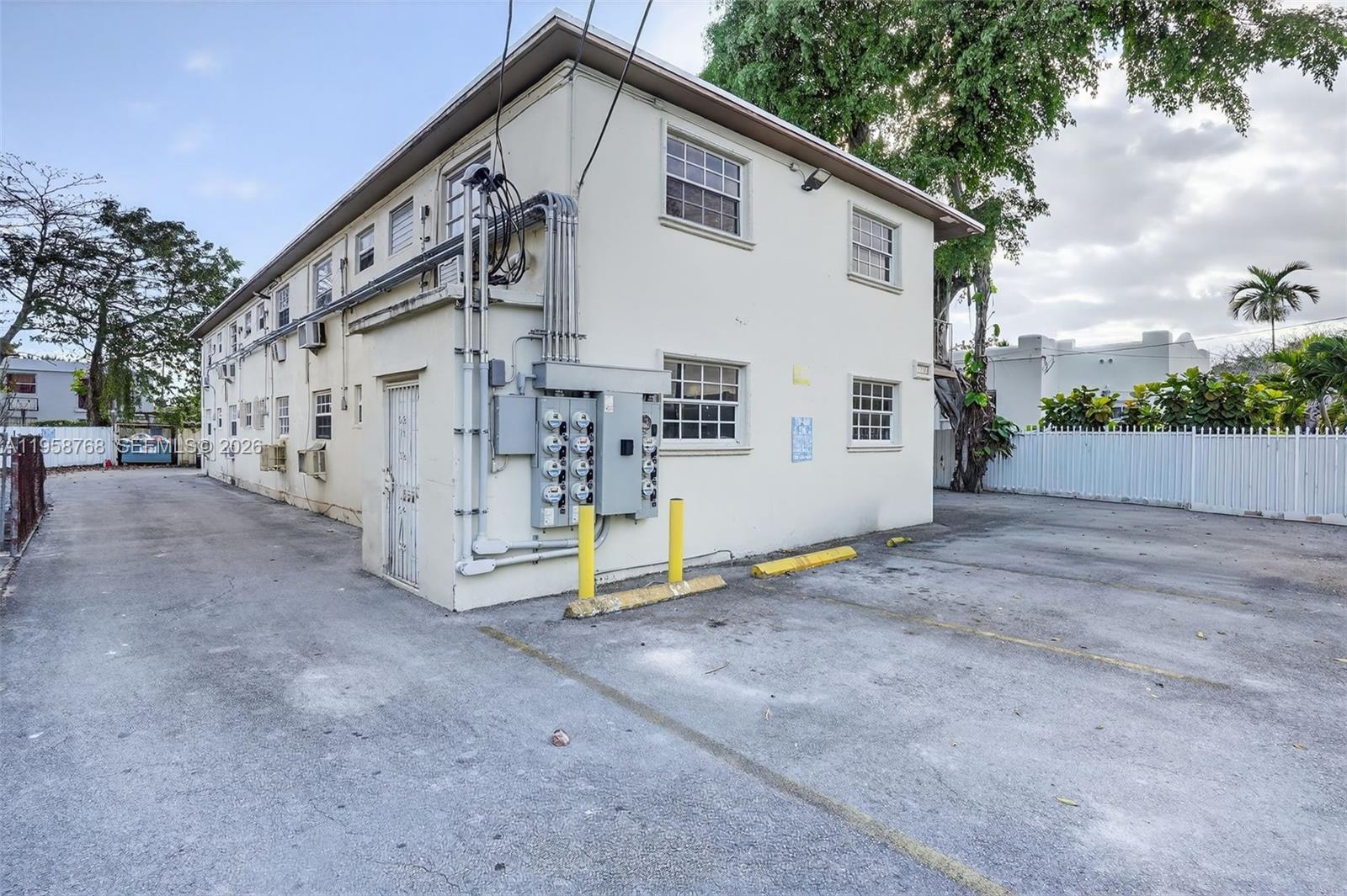 1736 Northwest 19th Street Miami, FL 33125 - Photo 8 of 17 a view of a house with a yard