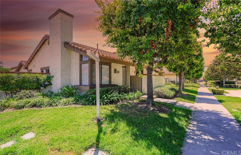 17 Filare Irvine, CA 92620 - Photo 1 of 46 a view of a house with a backyard and a tree