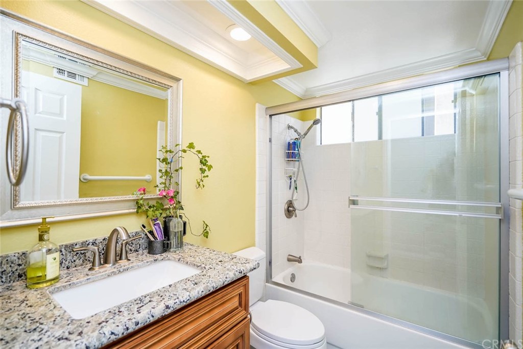 17 Filare Irvine, CA 92620 - Photo 11 of 46 a bathroom with a granite countertop sink toilet and shower