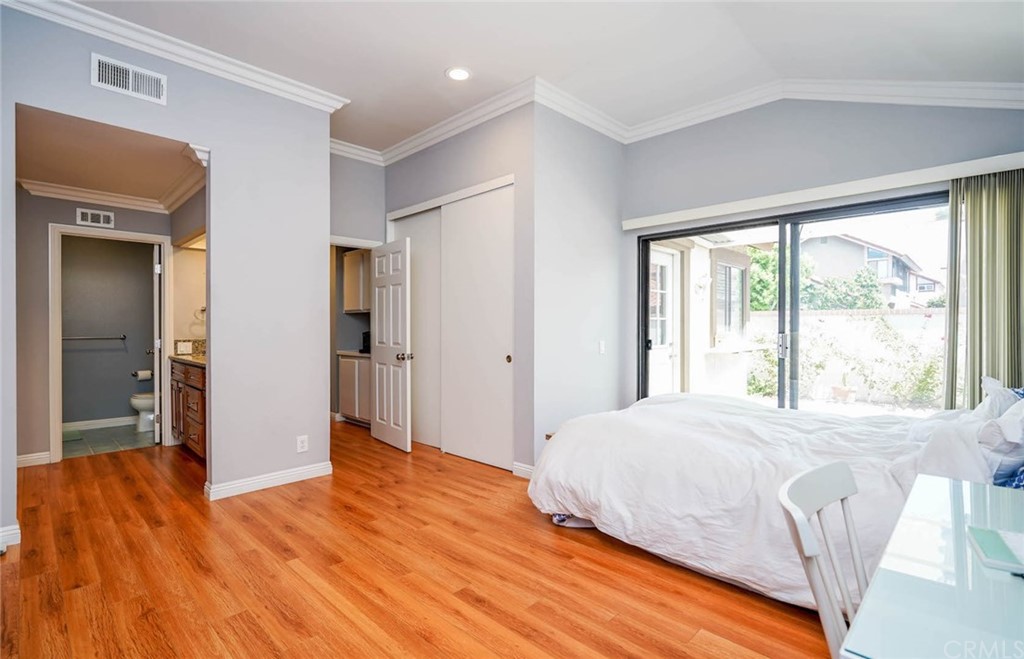 17 Filare Irvine, CA 92620 - Photo 14 of 46 a bedroom with a bed and a window