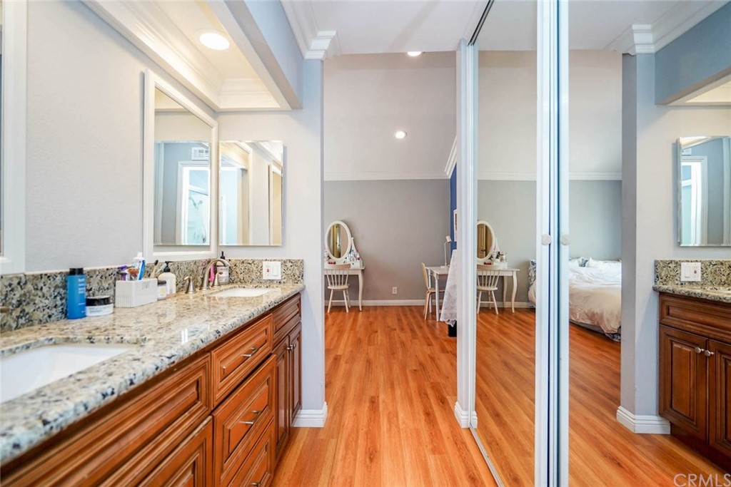 17 Filare Irvine, CA 92620 - Photo 21 of 46 a view of living room with granite countertop kitchen island wooden floor and stainless steel appliances