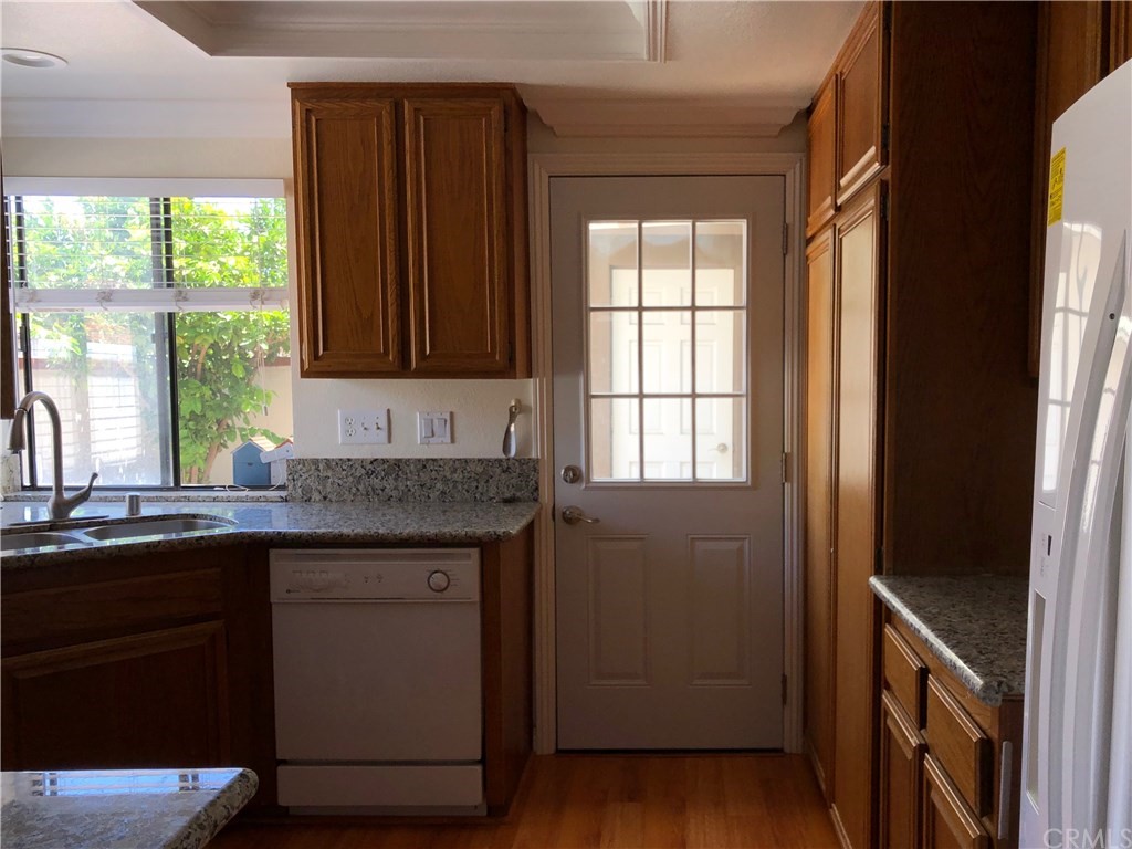 17 Filare Irvine, CA 92620 - Photo 24 of 46 a kitchen with granite countertop a sink and a window