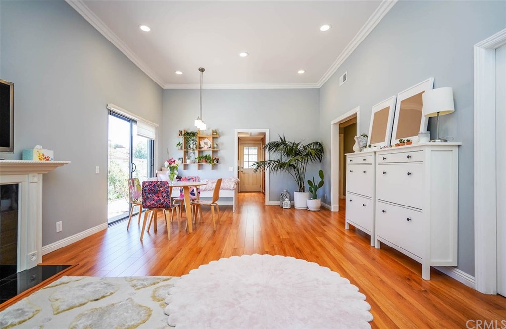 17 Filare Irvine, CA 92620 - Photo 3 of 46 a living room with furniture and a wooden floor