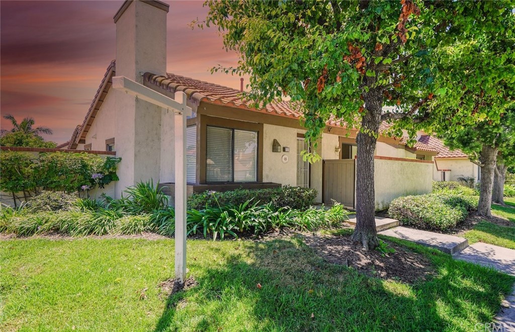 17 Filare Irvine, CA 92620 - Photo 35 of 46 a front view of a house with garden