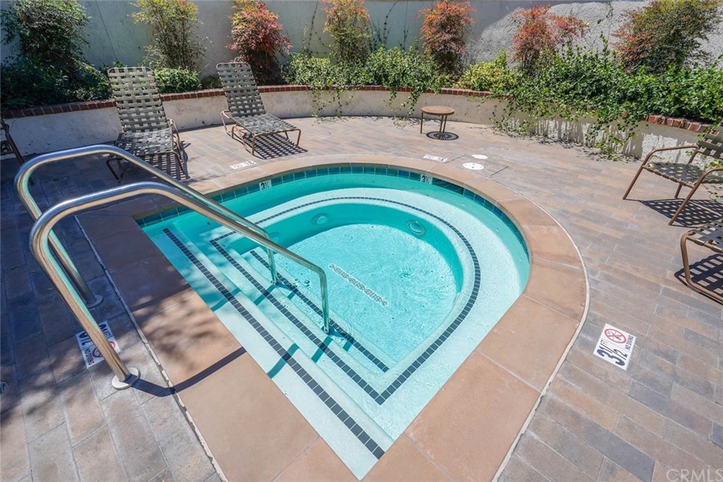 17 Filare Irvine, CA 92620 - Photo 45 of 46 an outdoor sitting area with a tub