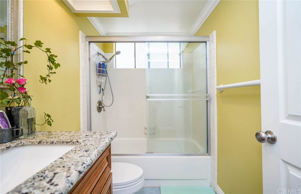 17 Filare Irvine, CA 92620 - Photo 10 of 46 a bathroom with a granite countertop sink toilet and shower