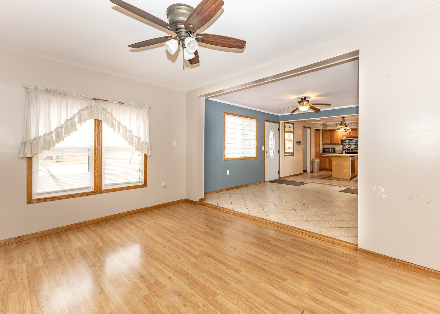 227 East 2nd Street Mineral, IL 61344 - Photo 23 of 28 a view of an empty room with window and wooden floor
