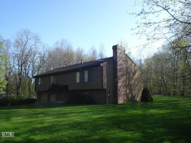 77 Williams Road Monroe, CT 06468 - Photo 1 of 1 a backyard of a house with lots of green space