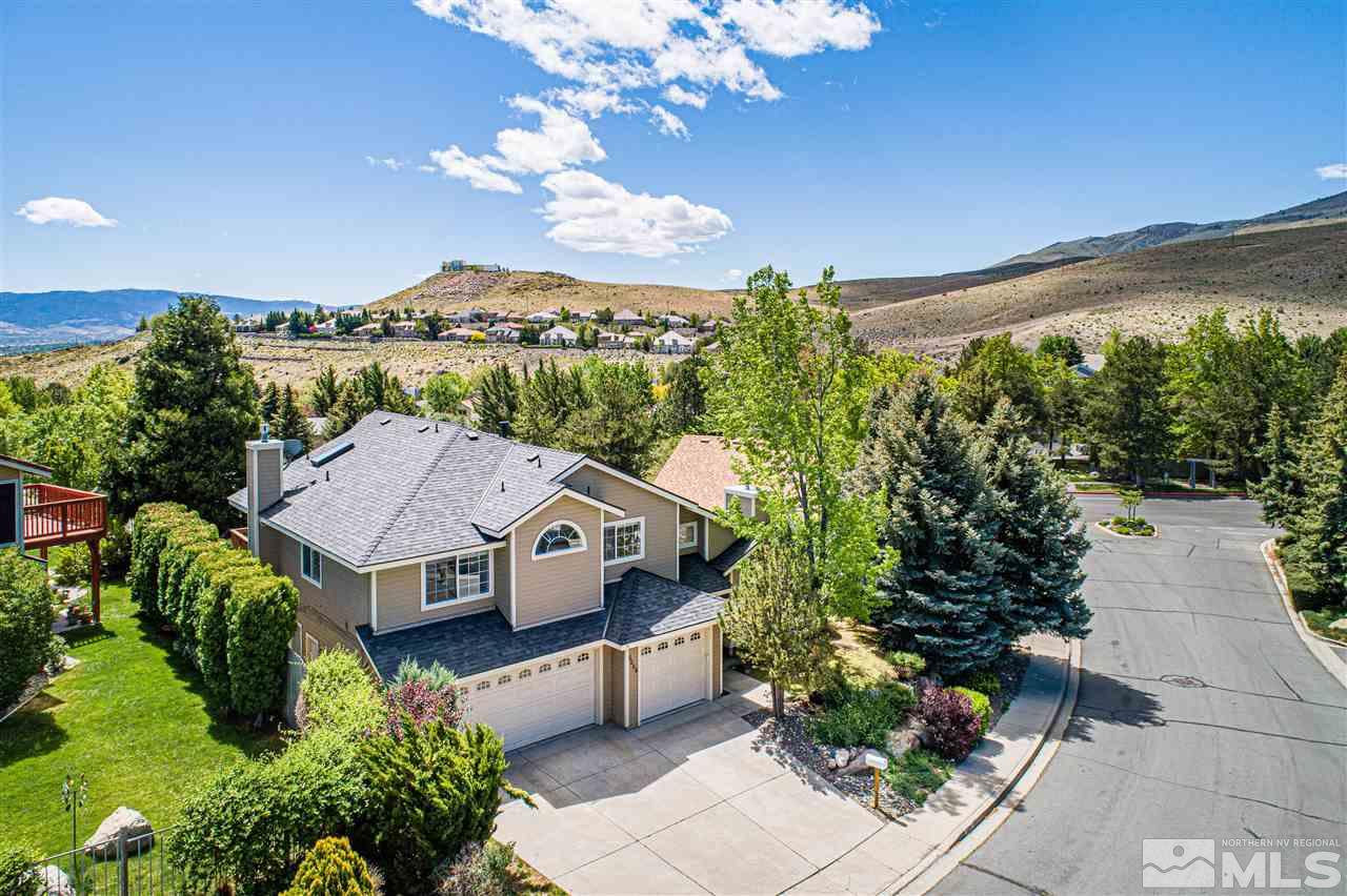 6284 Sunrise Meadows Loop Reno, NV 89519 - Photo 2 of 18 a house view with a garden space
