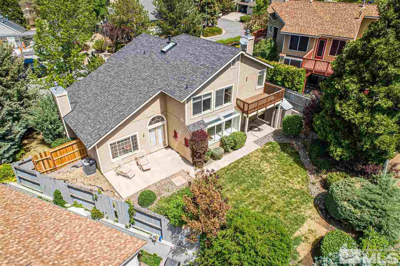 6284 Sunrise Meadows Loop Reno, NV 89519 - Photo 4 of 18 an aerial view of a house with a yard and plants