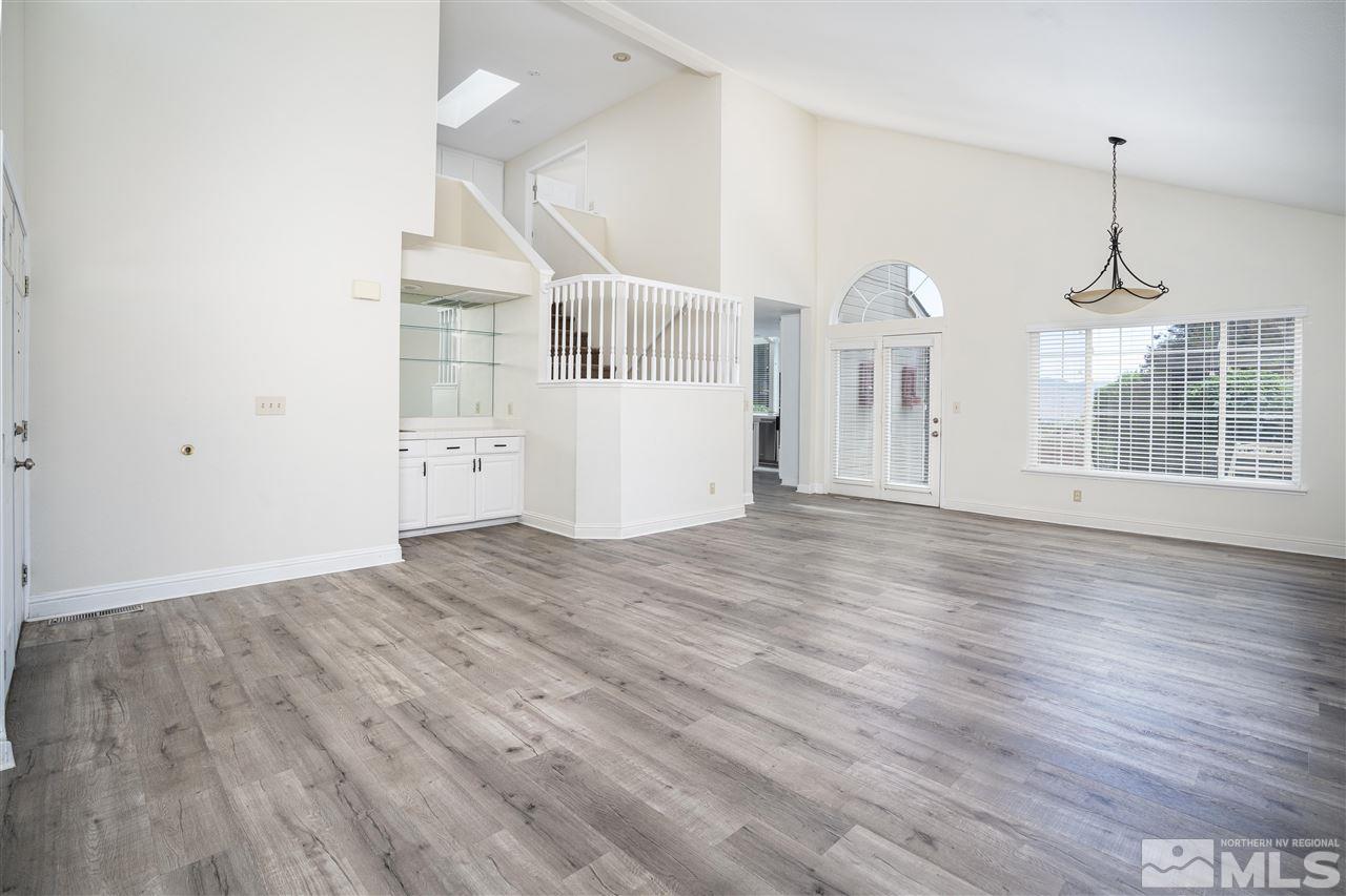 6284 Sunrise Meadows Loop Reno, NV 89519 - Photo 5 of 18 a view of empty room with wooden floor
