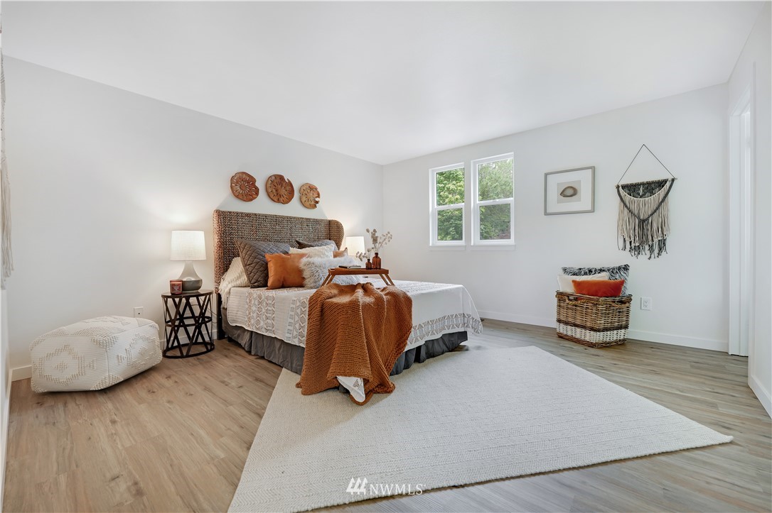 2807 Mill Avenue South Renton, WA 98055 - Photo 18 of 34 a bedroom with bed and a window