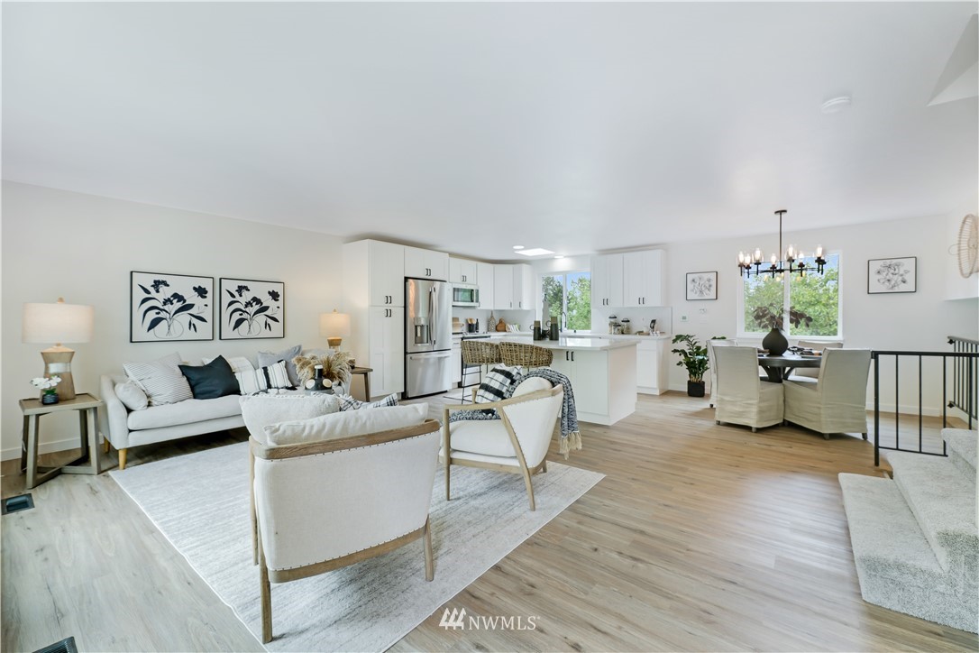 2807 Mill Avenue South Renton, WA 98055 - Photo 3 of 34 a living room with furniture and a wooden floor