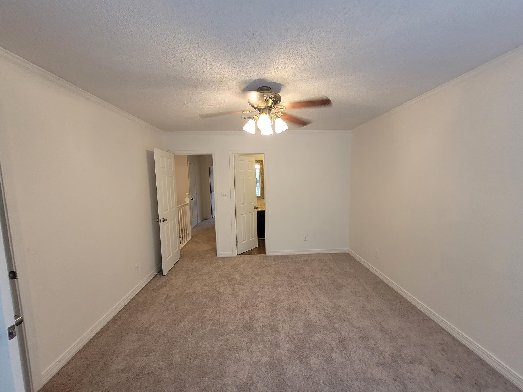 10039 Foxrun Road Pensacola, FL 32514 - Photo 5 of 9 wooden floor in an empty room with a window