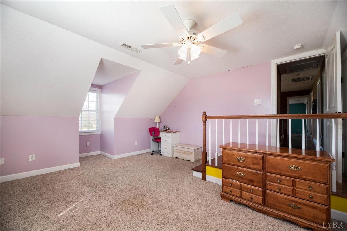 1158 Lowesville Road Amherst, VA 24521 - Photo 31 of 48 a view of a room with toys and a ceiling fan