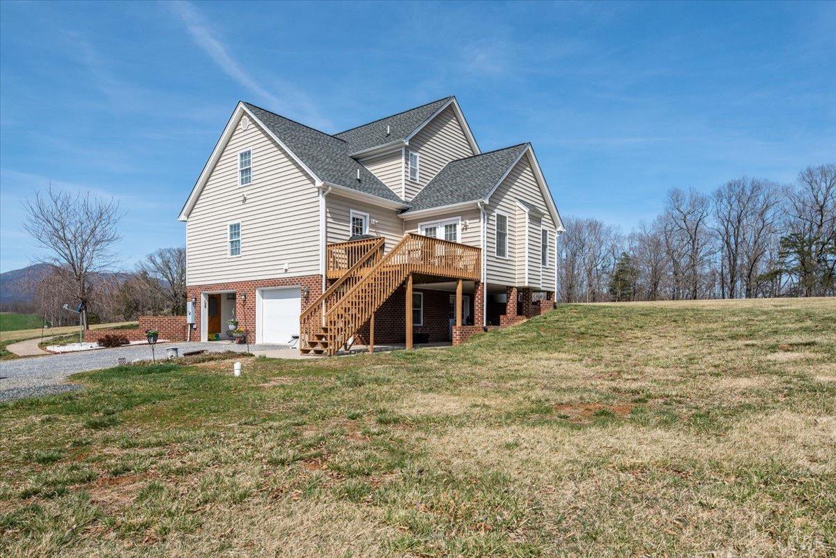1158 Lowesville Road Amherst, VA 24521 - Photo 36 of 48 a view of a house with a yard