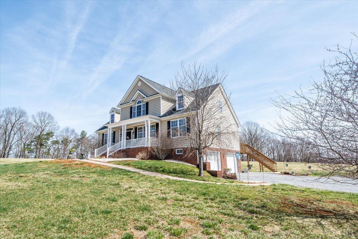 1158 Lowesville Road Amherst, VA 24521 - Photo 4 of 48 a view of a house with a yard