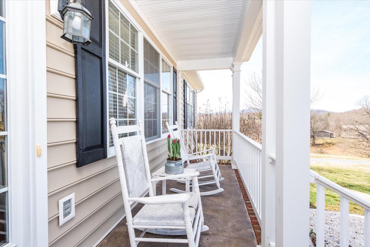 1158 Lowesville Road Amherst, VA 24521 - Photo 8 of 48 a view of a balcony with wooden floor