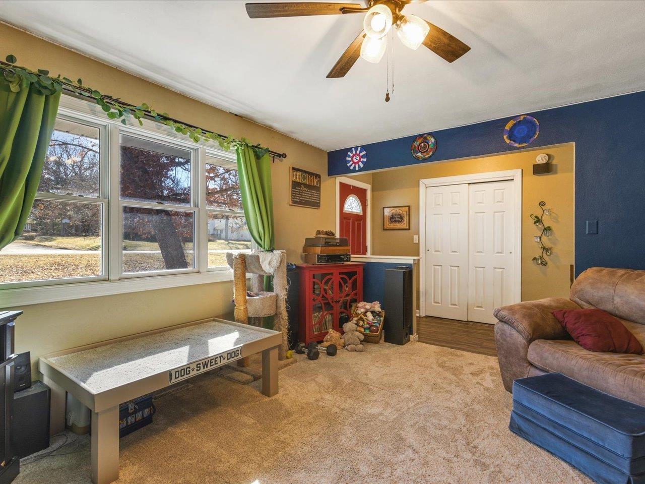 585 Knollwood Road Lake Summerset, IL 61019 - Photo 6 of 33 a living room with furniture a window and a flat screen tv