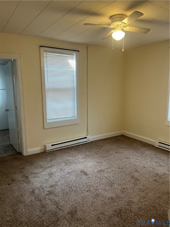 904 Cedar Level Road Hopewell, VA 23860 - Photo 9 of 11 Empty room with baseboard heating, light carpet, a