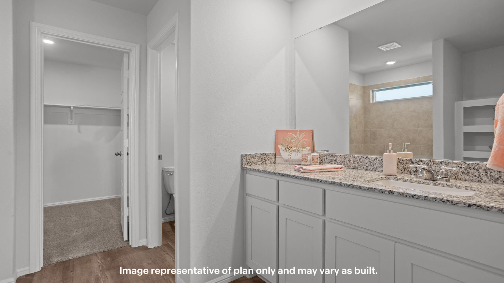 2316 150th Place Lubbock, TX 79423 - Photo 12 of 22 a bathroom with a sink and a mirror