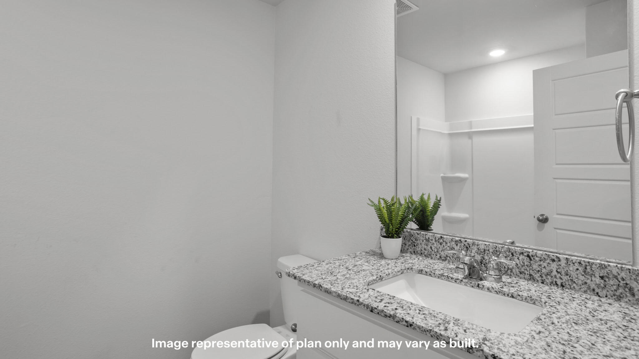 2316 150th Place Lubbock, TX 79423 - Photo 16 of 22 a bathroom with a granite countertop sink a mirror and a potted plant