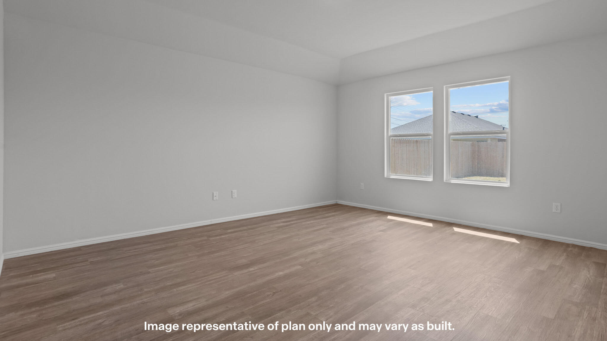 2316 150th Place Lubbock, TX 79423 - Photo 7 of 22 an empty room with wooden floor and windows