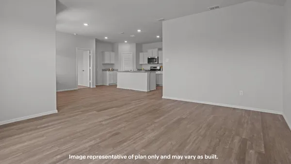 a view of kitchen with wooden floor