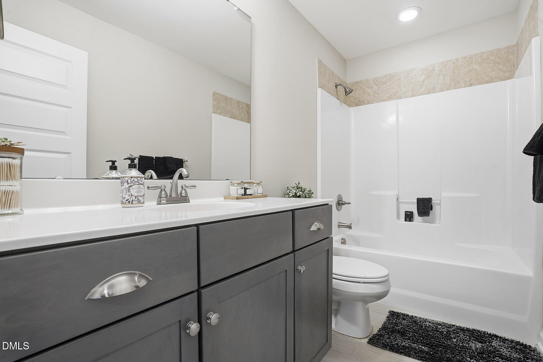 240 North Ridge Drive Louisburg, NC 27549 - Photo 19 of 31 a bathroom with a sink toilet and shower