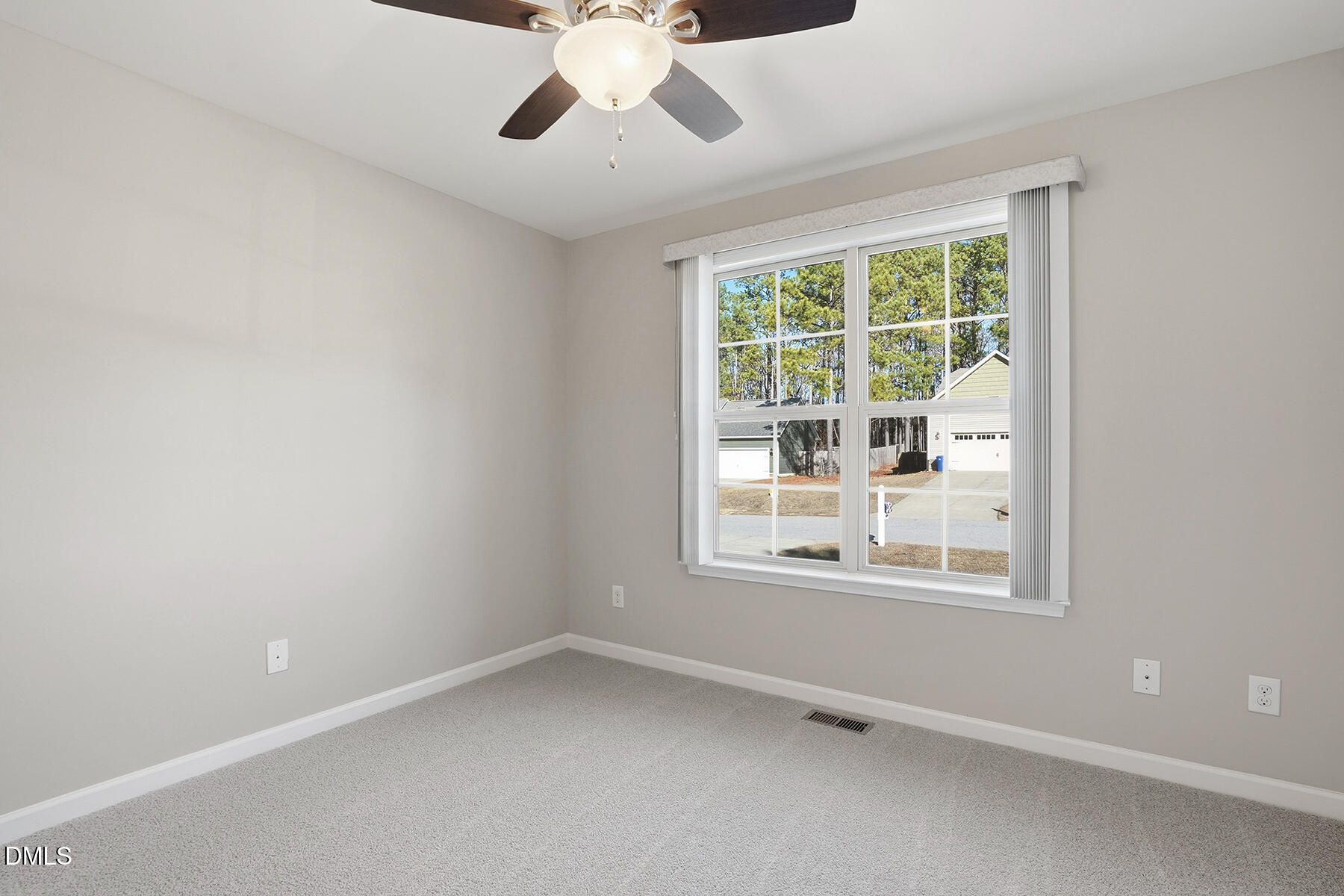 240 North Ridge Drive Louisburg, NC 27549 - Photo 20 of 31 an empty room with a window
