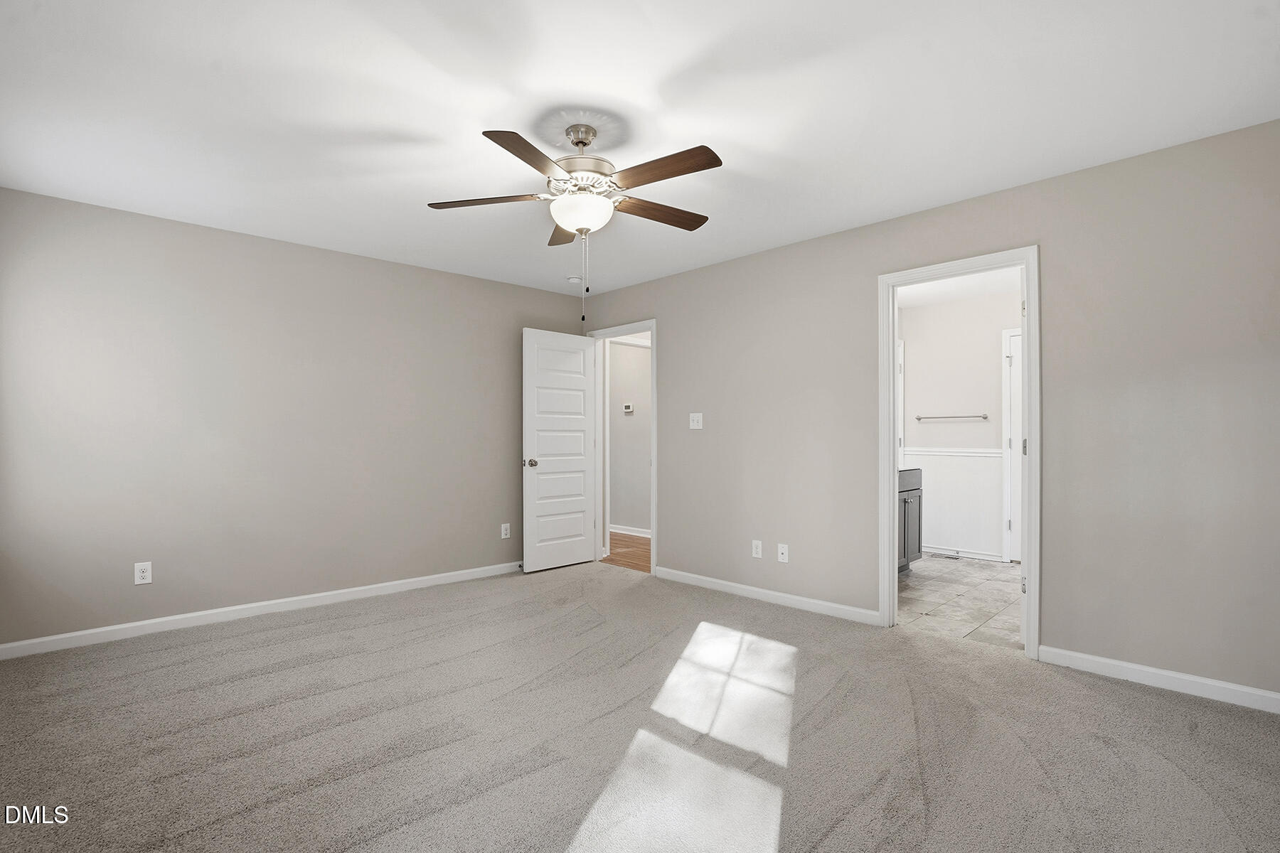 240 North Ridge Drive Louisburg, NC 27549 - Photo 22 of 31 an empty room with closet and windows