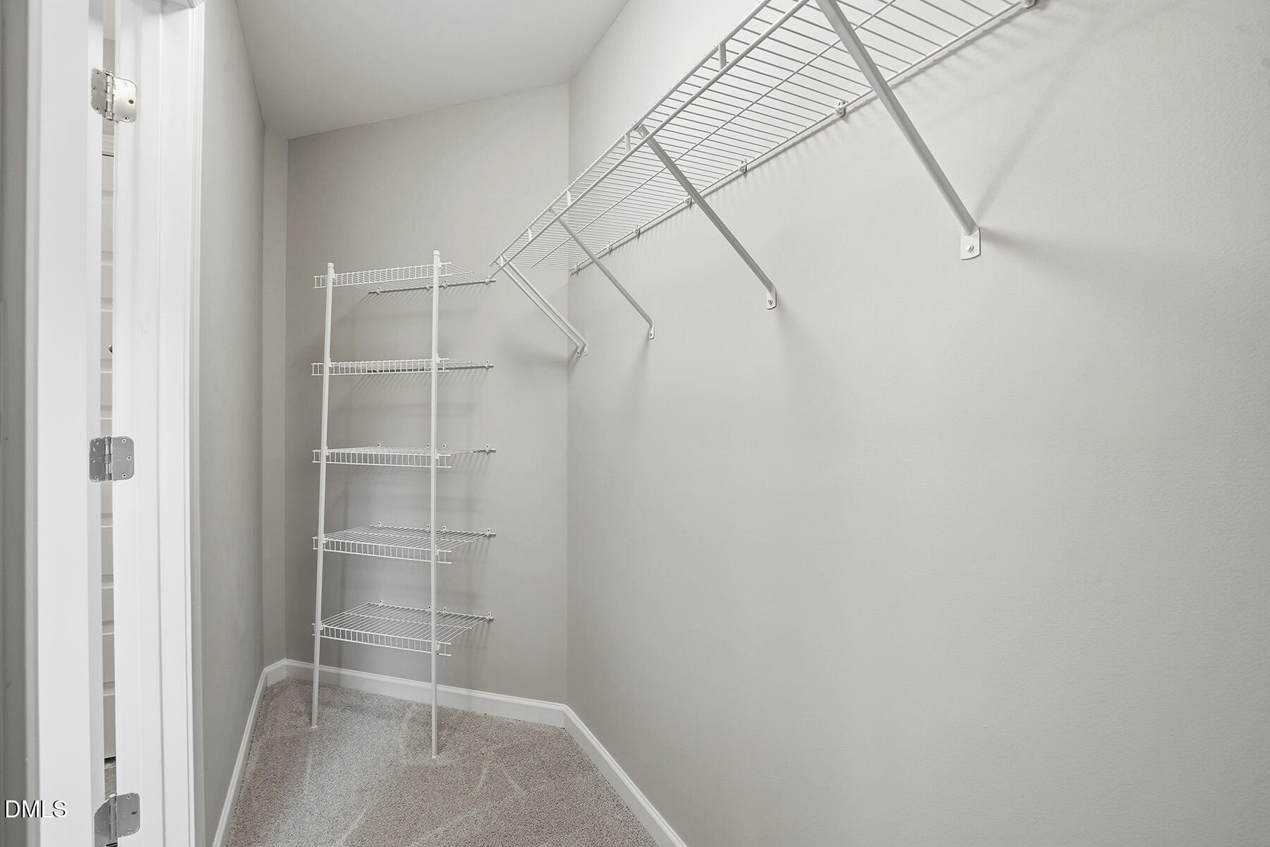 240 North Ridge Drive Louisburg, NC 27549 - Photo 25 of 31 a view of a room with racks on the wall