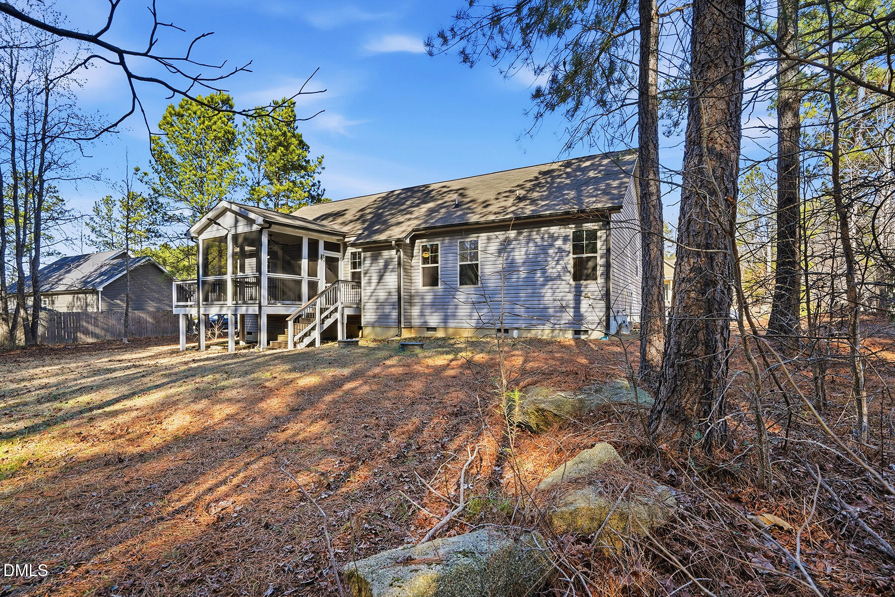 240 North Ridge Drive Louisburg, NC 27549 - Photo 28 of 31 a front view of a house with a yard and garage