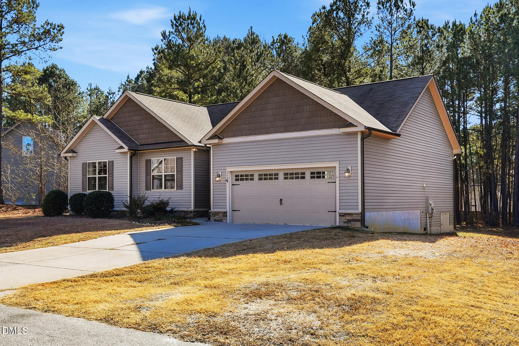 240 North Ridge Drive Louisburg, NC 27549 - Photo 2 of 31 a view of a house with a yard