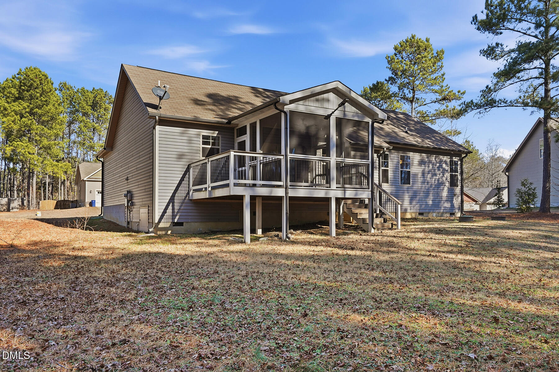 240 North Ridge Drive Louisburg, NC 27549 - Photo 30 of 31 a front view of a house with a garden