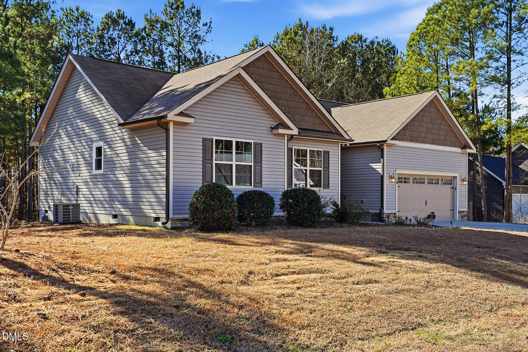 240 North Ridge Drive Louisburg, NC 27549 - Photo 3 of 31 a view of a house with a yard