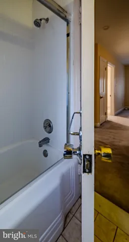 a bathroom with a bathtub