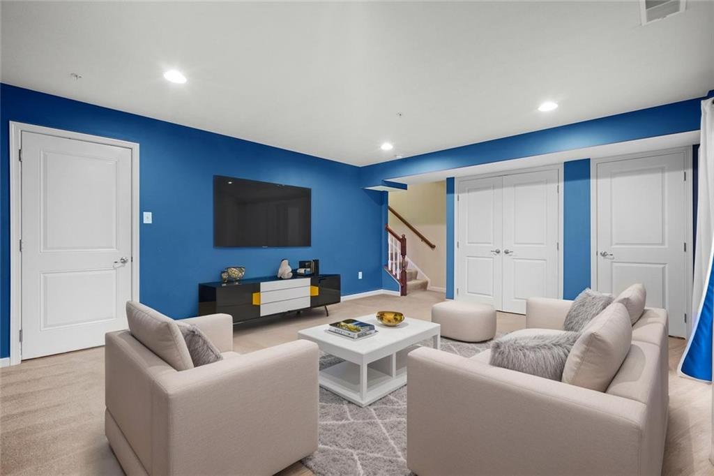 113 Maple Ridge Court Canonsburg, PA 15317 - Photo 15 of 27 a living room with furniture and a flat screen tv