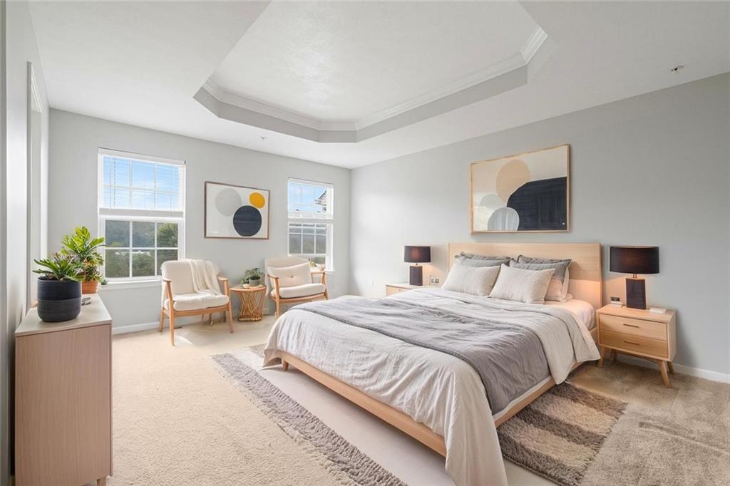 113 Maple Ridge Court Canonsburg, PA 15317 - Photo 20 of 27 a spacious bedroom with a bed and a couch