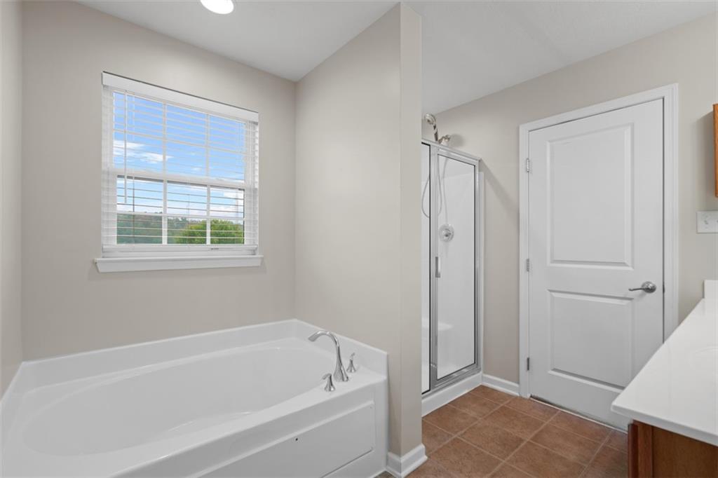 113 Maple Ridge Court Canonsburg, PA 15317 - Photo 21 of 27 a bathroom with a bathtub and a shower
