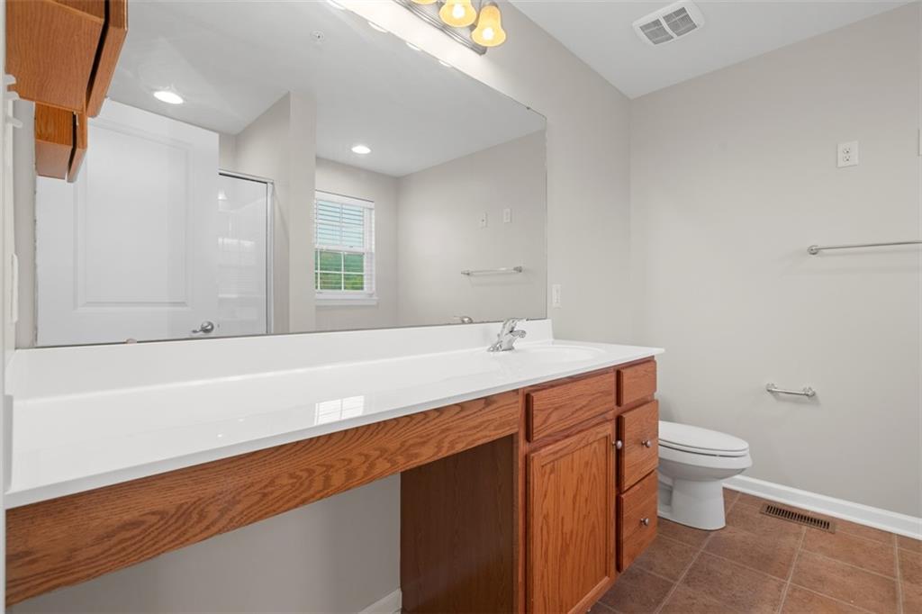 113 Maple Ridge Court Canonsburg, PA 15317 - Photo 22 of 27 a bathroom with a sink a toilet and a bathtub
