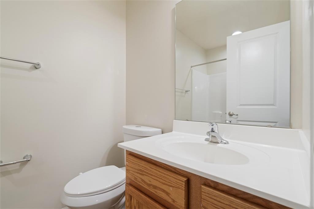 113 Maple Ridge Court Canonsburg, PA 15317 - Photo 24 of 27 a bathroom with a sink a toilet and a mirror