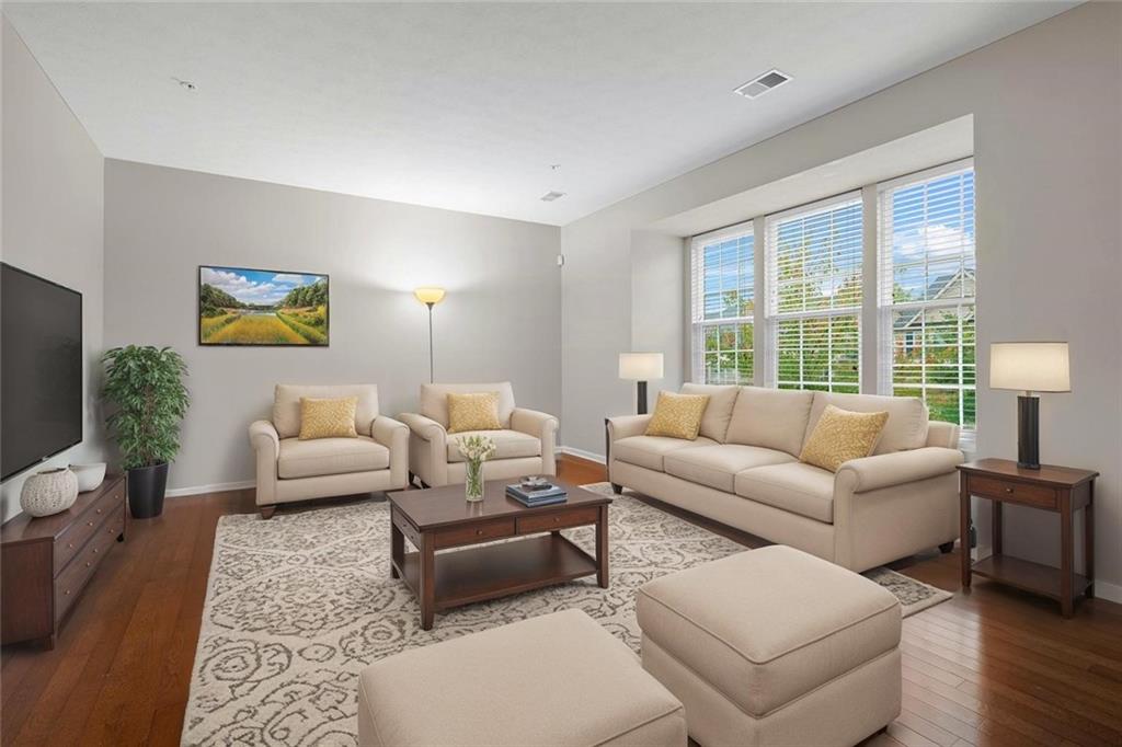 113 Maple Ridge Court Canonsburg, PA 15317 - Photo 4 of 27 a living room with furniture and a large window