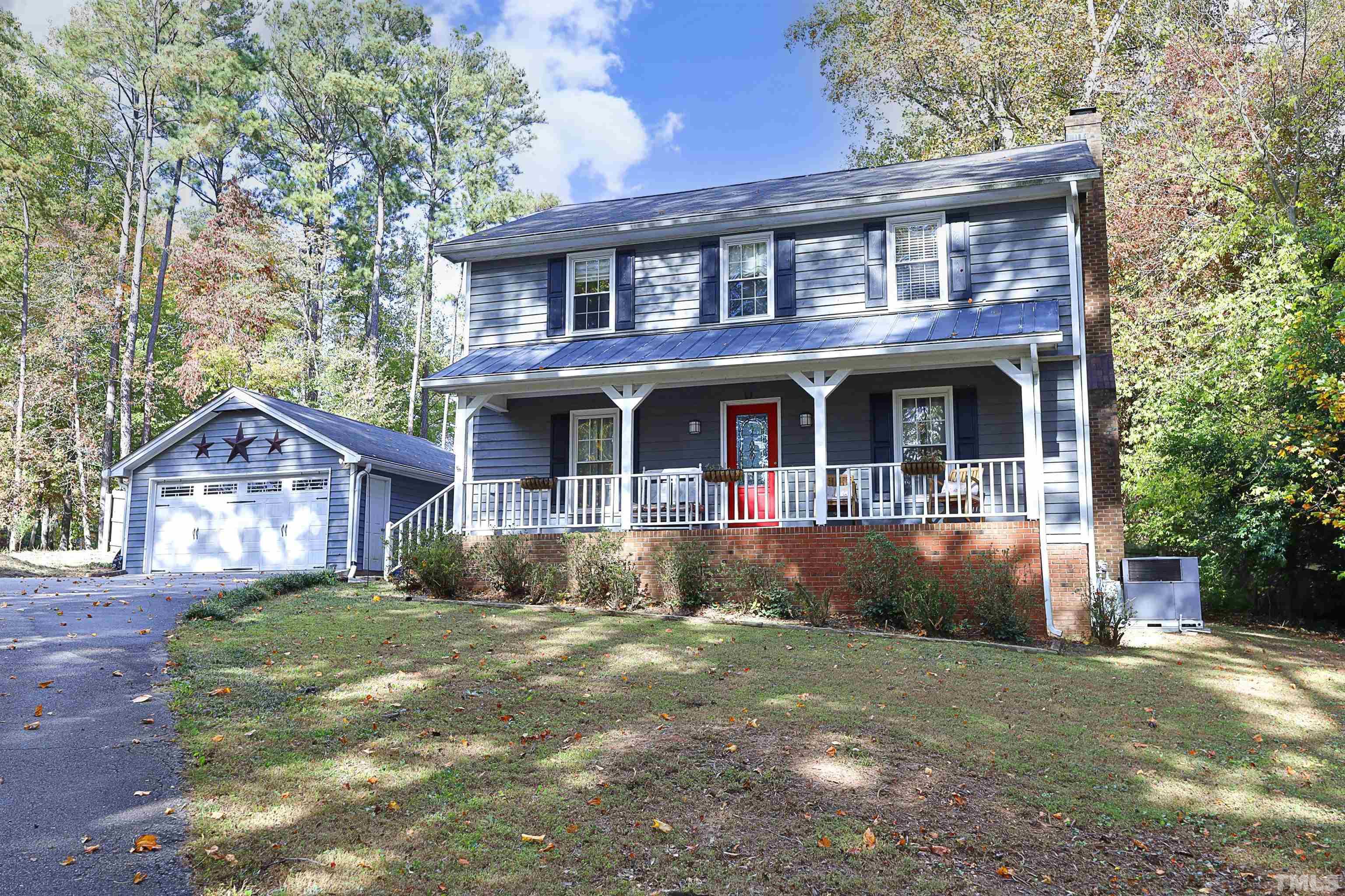 5308 Country Trail Raleigh, NC 27613 - Photo 1 of 51 a front view of a house with a yard